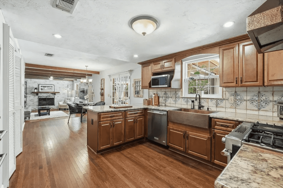 Spacious kitchen with wooden cabinets