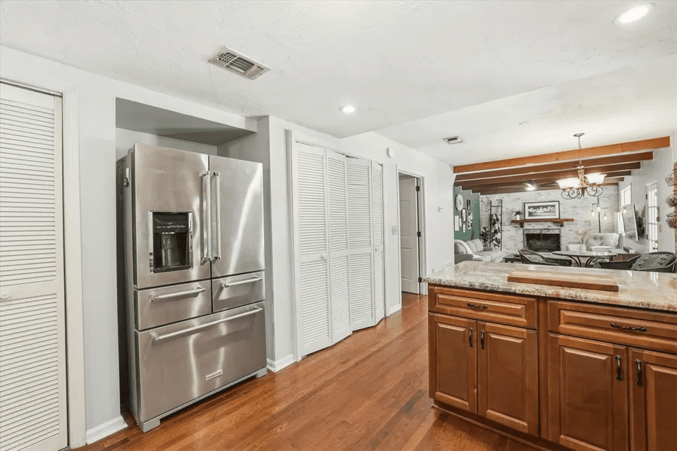 Spacious kitchen with wooden cabinets