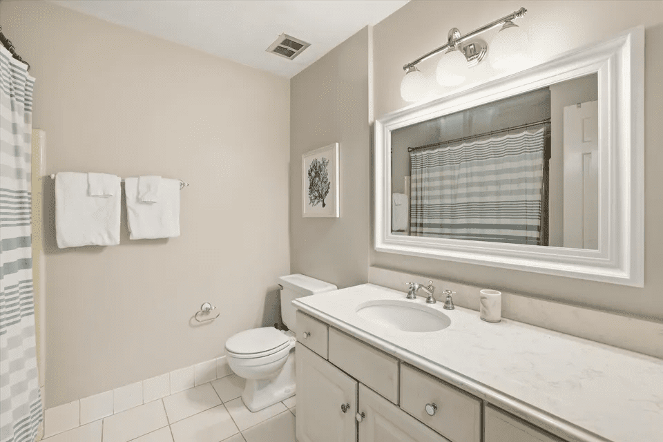 Clean bathroom featuring a white countertop