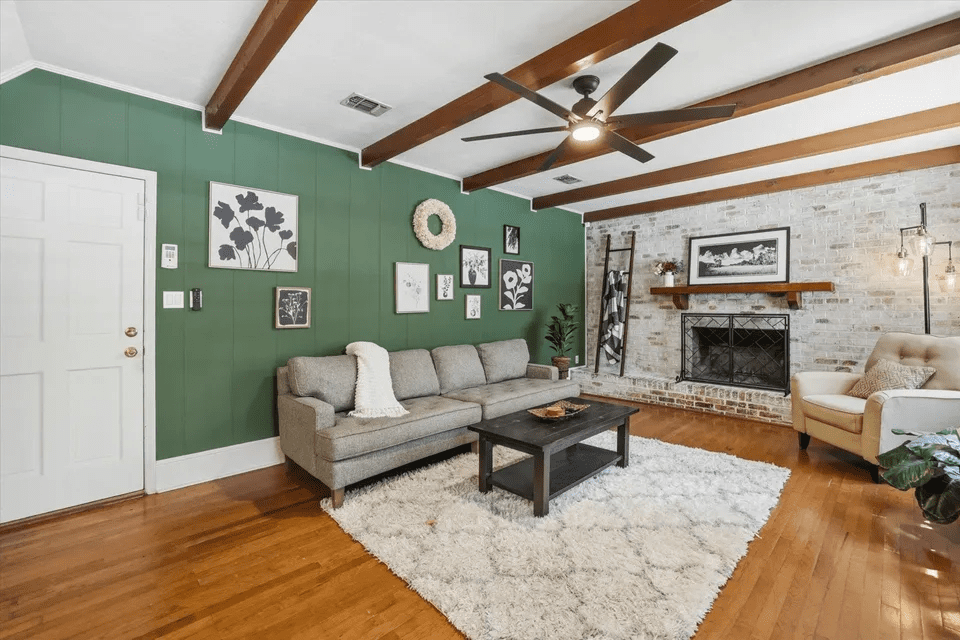 Modern living area with exposed beams