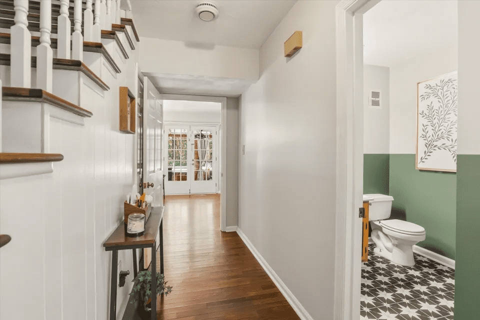 Entrance hallway with patterned bathroom floor