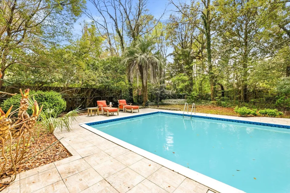 Serene poolside surrounded by trees