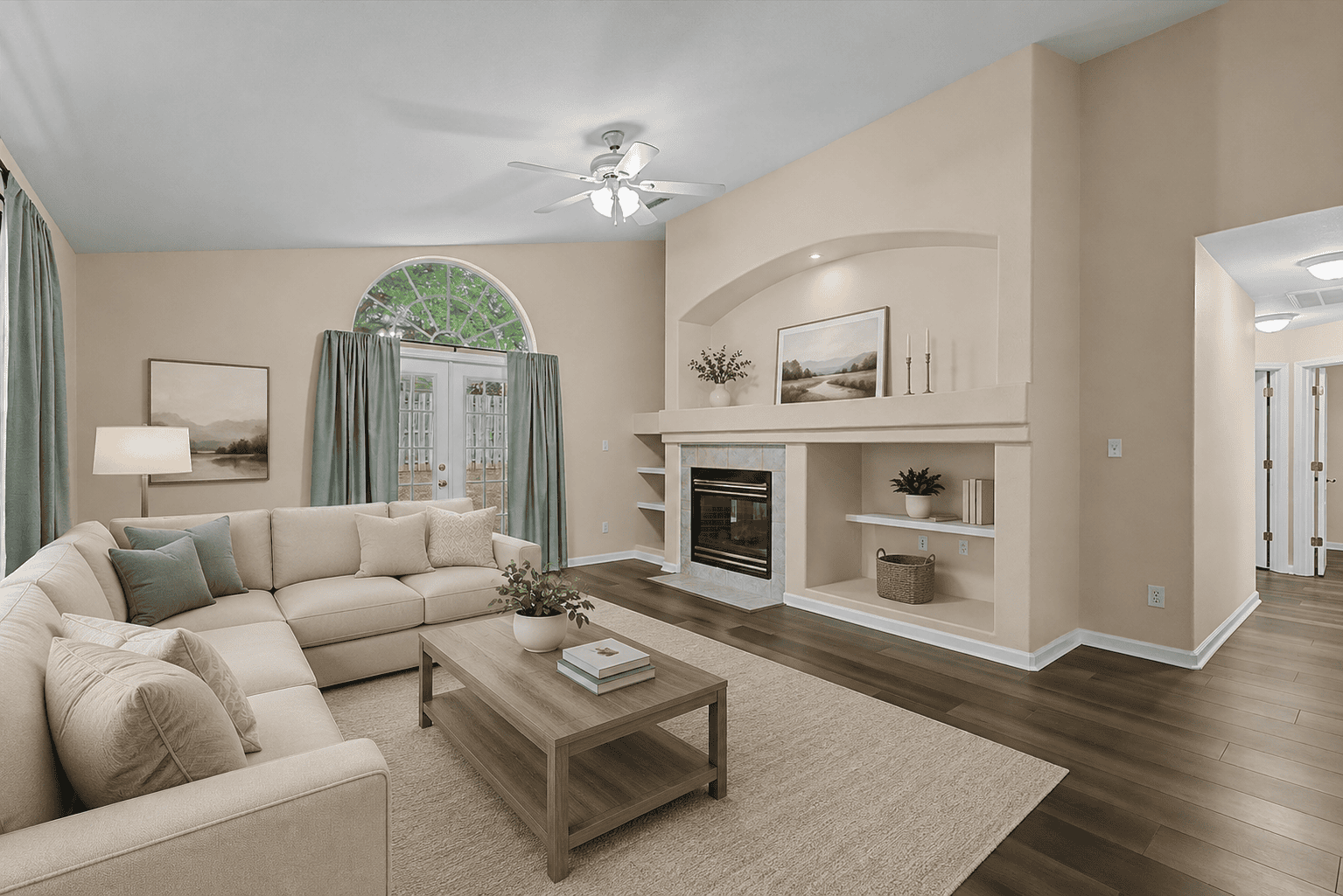 Beige sectional living room with arched window